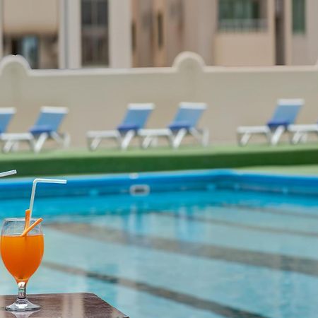 Отель Al Bustan Flats Шарджа Экстерьер фото